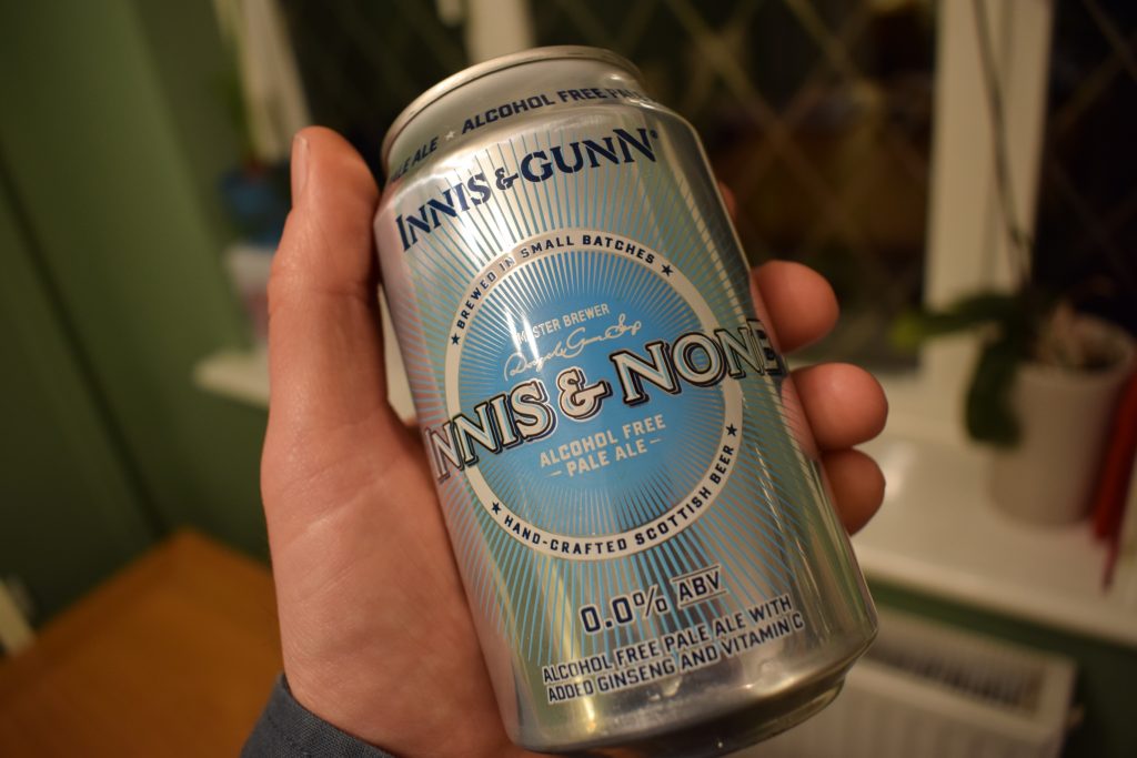 Innis and Gunn 'Innis and None' 0% pale ale can in hand