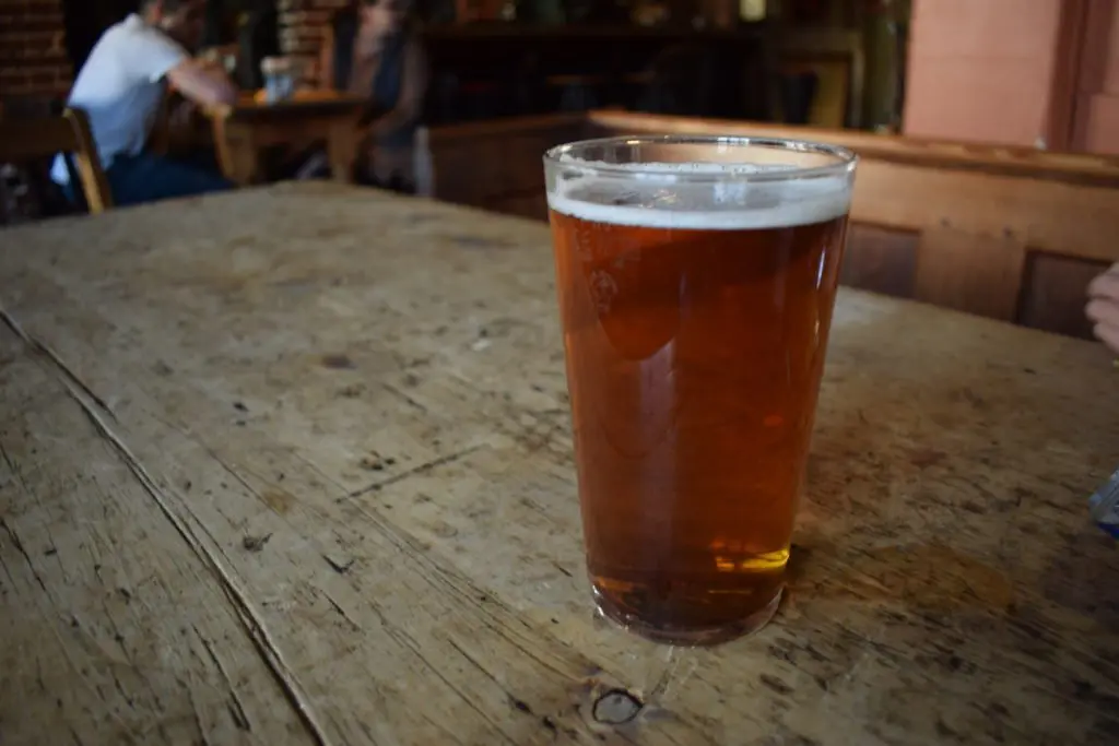 A pint of beer in a pub
