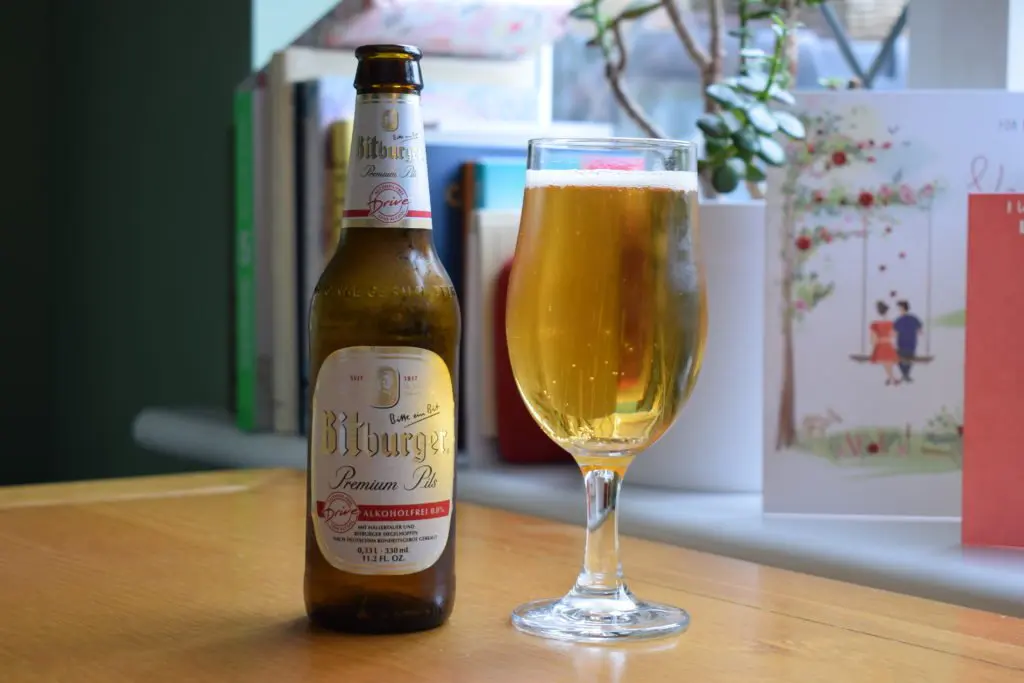 Bitburger Drive alcohol-free lager bottle and glass