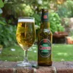 Cerveja Cheers Branca non-alcoholic lager bottle and glass