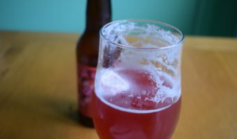 Mikkeller Raspberry Limbo non-alcoholic sour beer - close up of glass and foam